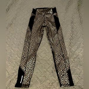 Gold and black Puma Leggings